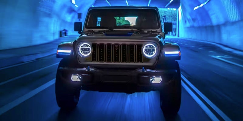 2024 Jeep Wrangler driving through a tunnel