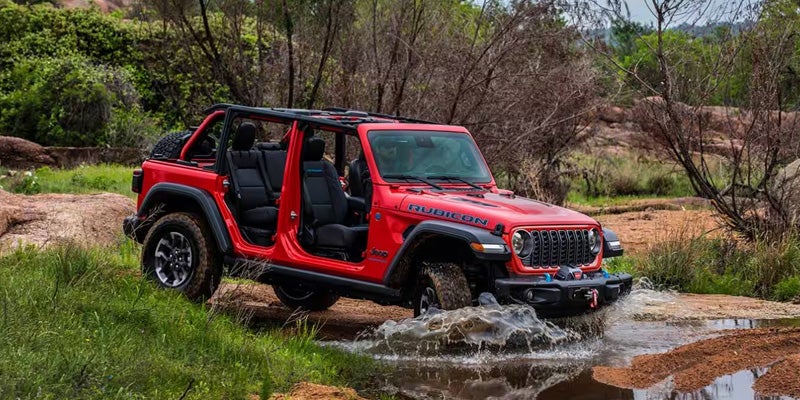 2025 Jeep Wrangler driving off-road