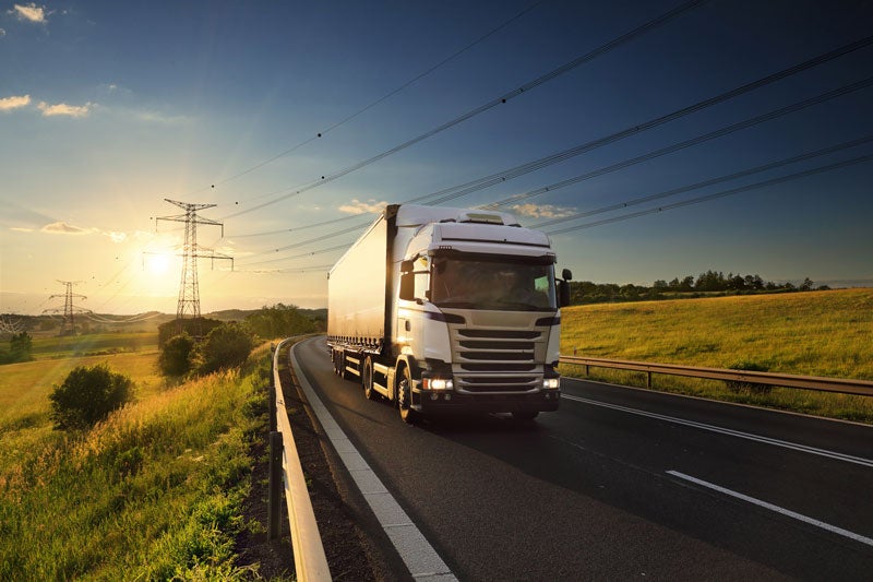 A truck driving on Highway